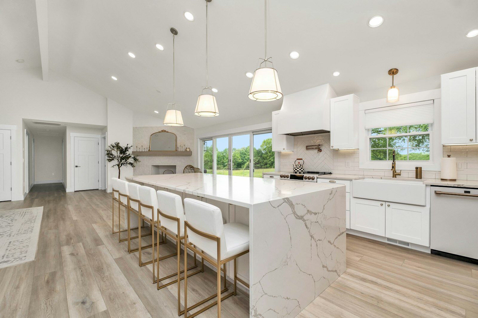 White kitchen with finished walls and ceiling